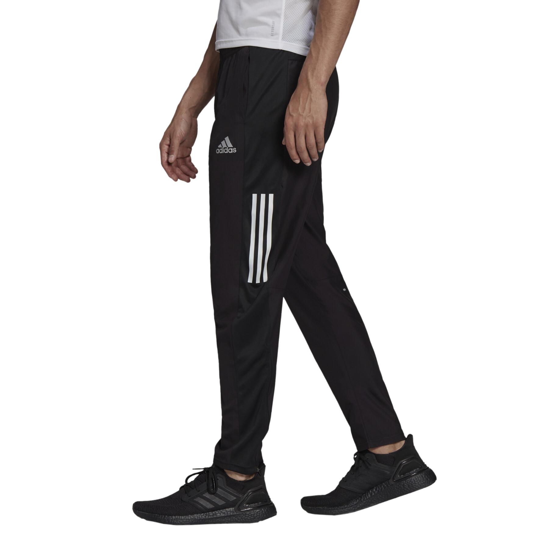 Spodnie joggingowe adidas Own The Run Astro Wind